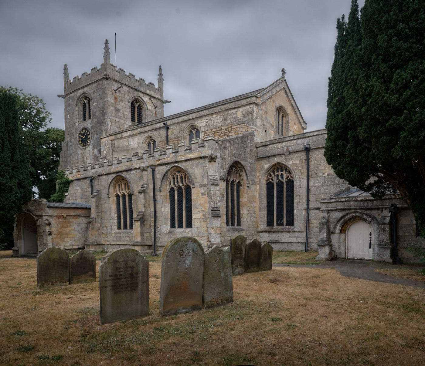 All Saints', Belton — the church where the Brocks enter the written record, on the earliest leaves of its register. Photographed by Jon Brock on a family visit, 21 July 2026. © Jon Brock 2026.